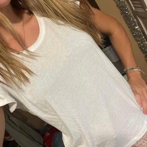 Plain white express tee with ruffle sleeve size small